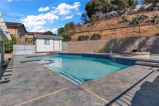 1010 W Yorktown Ave, Montebello, CA 90640 - view of swimming pool with a patio area, an outdoor structure, and a pool with connected hot tub