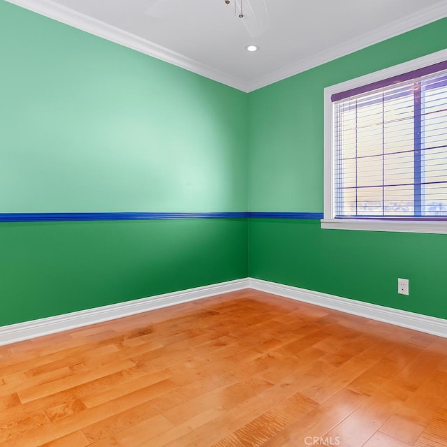 1010 W Yorktown Ave, Montebello, CA 90640 - spare room featuring wood finished floors and ornamental molding