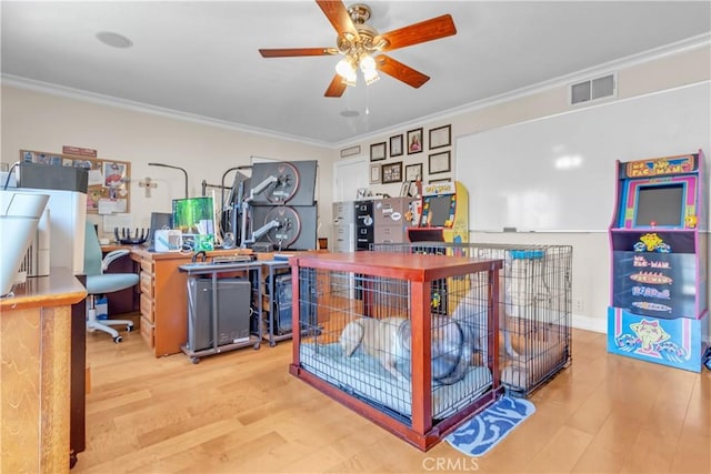 1010 W Yorktown Ave, Montebello, CA 90640 - office area featuring crown molding, wood finished floors, and ceiling fan