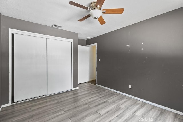5956 Marlatt St, Jurupa Valley, CA 91752 - unfurnished bedroom featuring wood finished floors, a closet, and ceiling fan