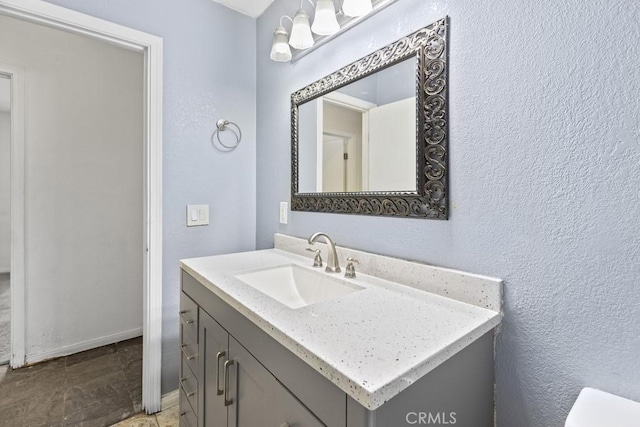 5956 Marlatt St, Jurupa Valley, CA 91752 - half bathroom with vanity and a textured wall