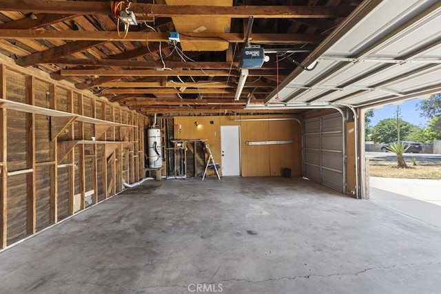 5956 Marlatt St, Jurupa Valley, CA 91752 - garage with a garage door opener and a central vacuum unit