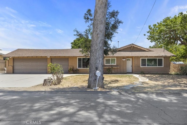 5956 Marlatt St, Jurupa Valley, CA 91752 - ranch-style home featuring driveway and an attached garage