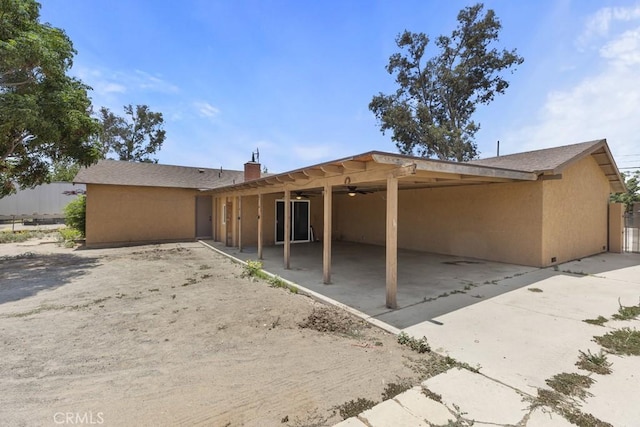 5956 Marlatt St, Jurupa Valley, CA 91752 - view of front of property featuring a ceiling fan, stucco siding, and a patio area