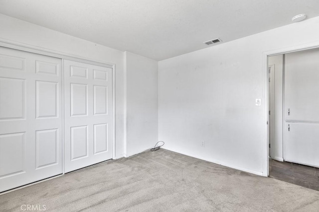 5956 Marlatt St, Jurupa Valley, CA 91752 - unfurnished bedroom featuring carpet flooring and a closet
