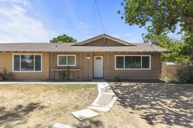 5956 Marlatt St, Jurupa Valley, CA 91752 - view of front of home with board and batten siding and roof with shingles