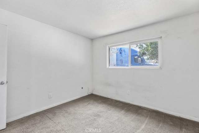 5956 Marlatt St, Jurupa Valley, CA 91752 - carpeted spare room with baseboards