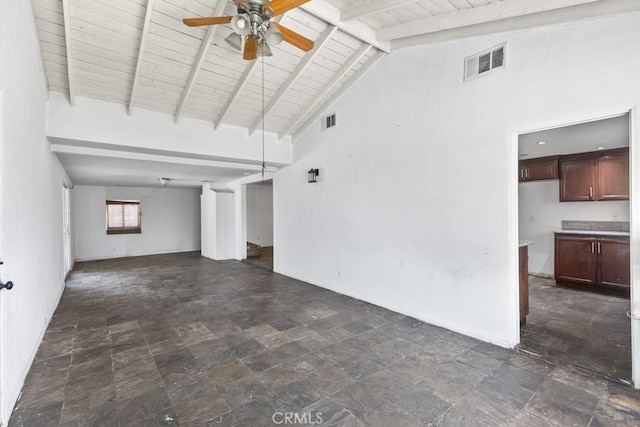 5956 Marlatt St, Jurupa Valley, CA 91752 - unfurnished living room featuring a ceiling fan, stone finish floors, beamed ceiling, and high vaulted ceiling