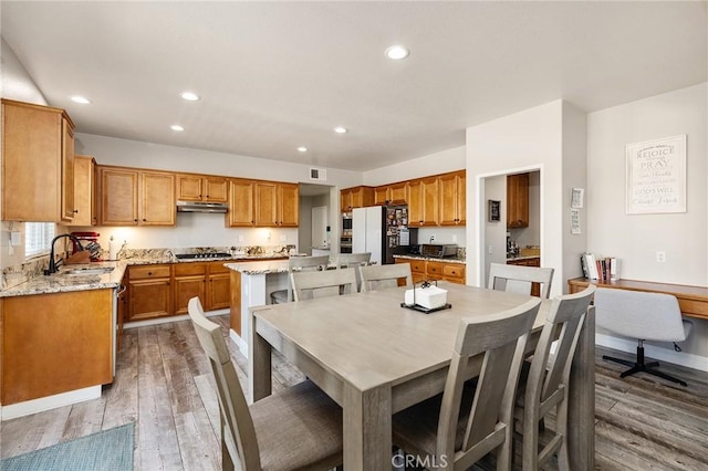 33883 Vinca Ln, Murrieta, CA 92563 - dining room with dark wood finished floors and recessed lighting