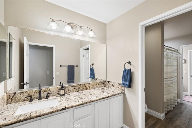33883 Vinca Ln, Murrieta, CA 92563 - bathroom with wood finished floors and vanity
