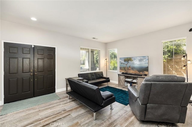 33883 Vinca Ln, Murrieta, CA 92563 - living area with light wood-type flooring, healthy amount of natural light, and recessed lighting