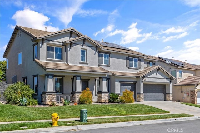 33883 Vinca Ln, Murrieta, CA 92563 - craftsman inspired home featuring covered porch, driveway, stucco siding, stone siding, and a front lawn