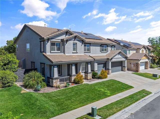 33883 Vinca Ln, Murrieta, CA 92563 - craftsman-style house featuring covered porch, driveway, stucco siding, stone siding, and solar panels