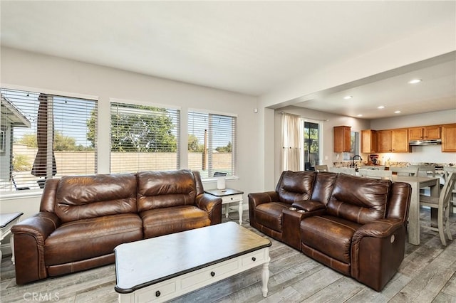 33883 Vinca Ln, Murrieta, CA 92563 - living area featuring light wood finished floors and recessed lighting
