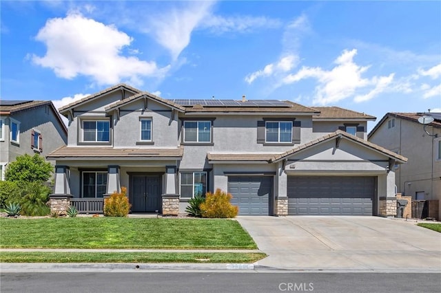 33883 Vinca Ln, Murrieta, CA 92563 - view of front of home with a front yard, stucco siding, concrete driveway, covered porch, and roof mounted solar panels
