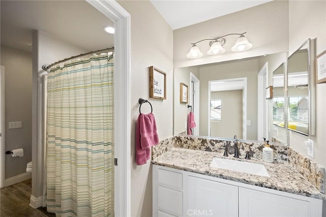 33883 Vinca Ln, Murrieta, CA 92563 - full bathroom with vanity, wood finished floors, and curtained shower