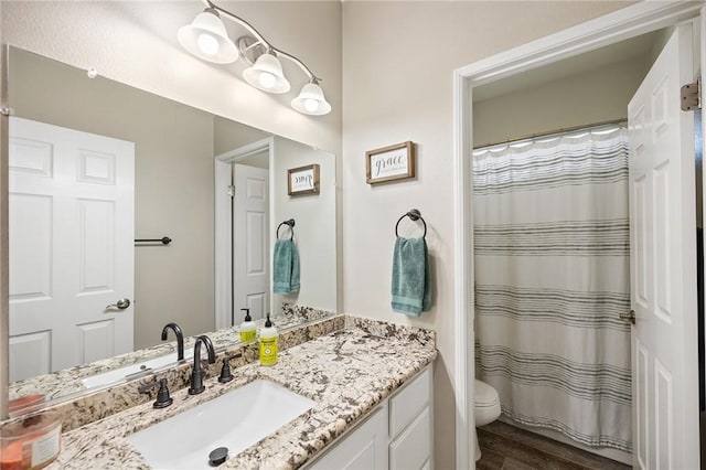33883 Vinca Ln, Murrieta, CA 92563 - bathroom with wood finished floors, vanity, and curtained shower