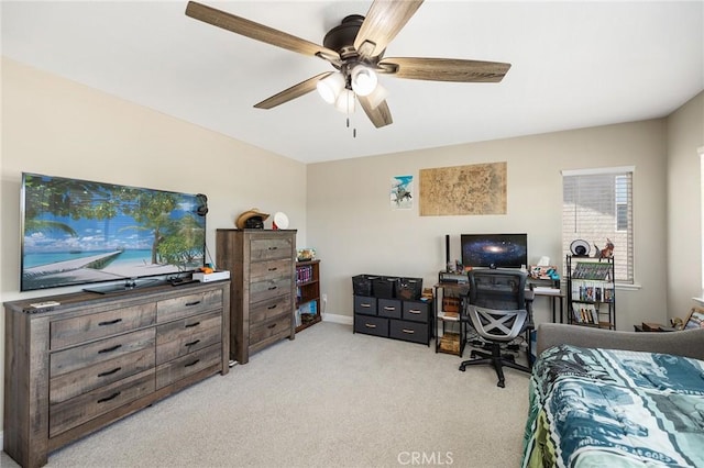 33883 Vinca Ln, Murrieta, CA 92563 - bedroom with an office area, light colored carpet, and a ceiling fan