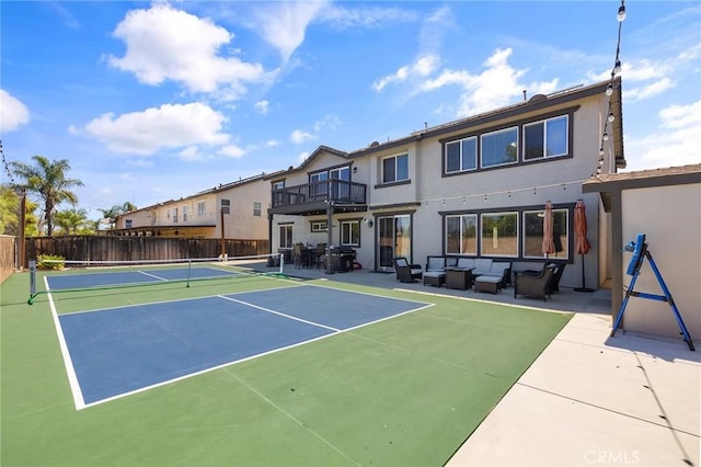 33883 Vinca Ln, Murrieta, CA 92563 - view of tennis court featuring an outdoor hangout area