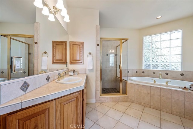 822 Noddy Ct, Arroyo Grande, CA 93420 - full bath featuring tile patterned flooring, a garden tub, a shower stall, vanity, and a chandelier