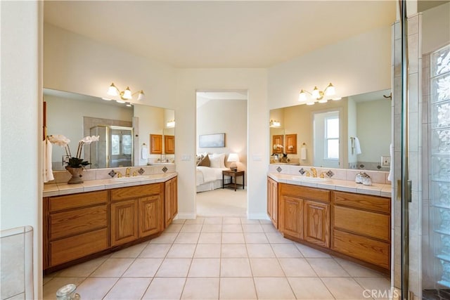 822 Noddy Ct, Arroyo Grande, CA 93420 - ensuite bathroom featuring two vanities, a stall shower, and tile patterned flooring