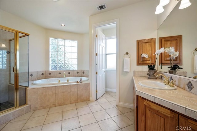 822 Noddy Ct, Arroyo Grande, CA 93420 - full bath with plenty of natural light, a garden tub, vanity, and a stall shower