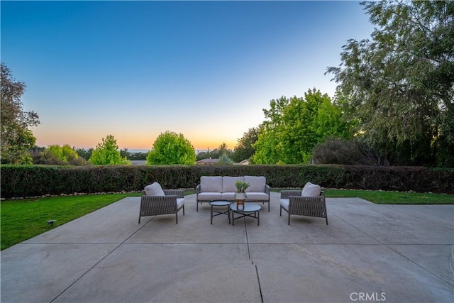 822 Noddy Ct, Arroyo Grande, CA 93420 - patio terrace at dusk featuring an outdoor hangout area, a patio area, and a lawn
