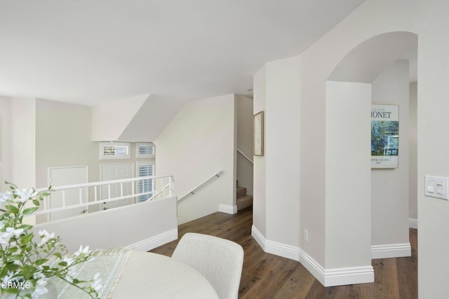 1051 Thomas Ln, Ventura, CA 93003 - corridor with wood finished floors, arched walkways, and stairway