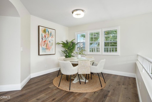 1051 Thomas Ln, Ventura, CA 93003 - dining space featuring wood finished floors and arched walkways