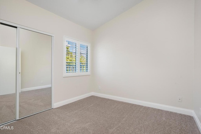 1051 Thomas Ln, Ventura, CA 93003 - unfurnished bedroom with carpet flooring, lofted ceiling, and a closet