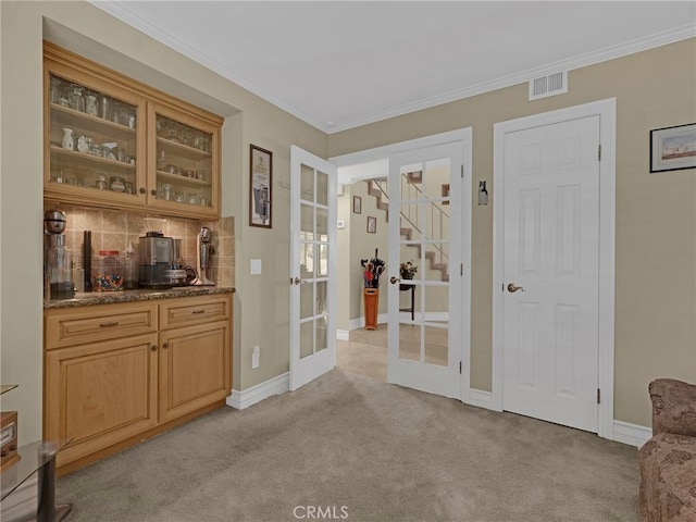 28702 Eagleton St, Agoura Hills, CA 91301 - sitting room featuring french doors, light carpet, crown molding, and stairway