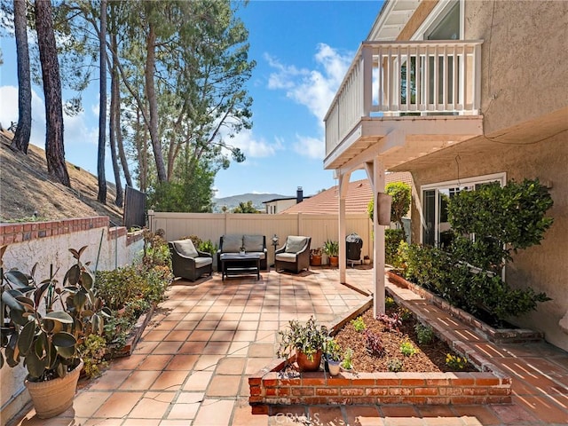 28702 Eagleton St, Agoura Hills, CA 91301 - patio / terrace featuring an outdoor hangout area, a patio, and a fenced backyard