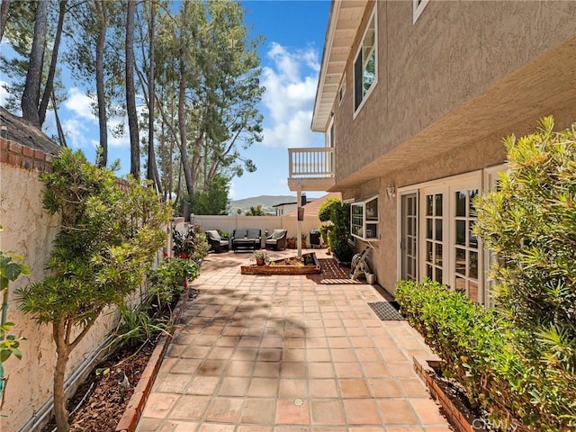 28702 Eagleton St, Agoura Hills, CA 91301 - patio / terrace featuring outdoor lounge area, a patio area, a fenced backyard, and french doors
