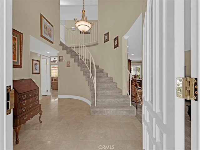 28702 Eagleton St, Agoura Hills, CA 91301 - entryway featuring a towering ceiling, stairway, and light tile patterned flooring