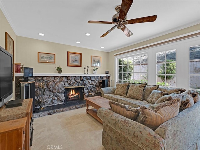 28702 Eagleton St, Agoura Hills, CA 91301 - tiled living area featuring a stone fireplace, a ceiling fan, crown molding, and recessed lighting