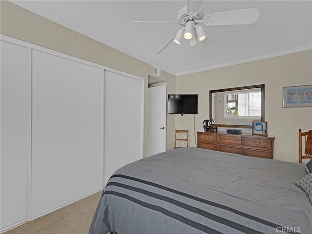 28702 Eagleton St, Agoura Hills, CA 91301 - carpeted bedroom featuring ornamental molding, a closet, and a ceiling fan