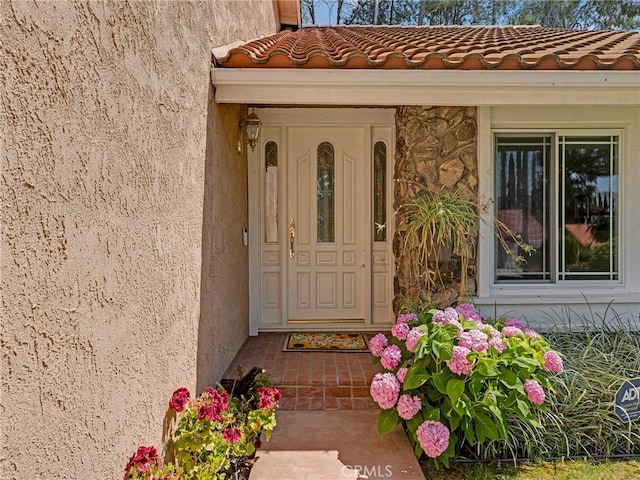 28702 Eagleton St, Agoura Hills, CA 91301 - doorway to property with a tiled roof and stucco siding