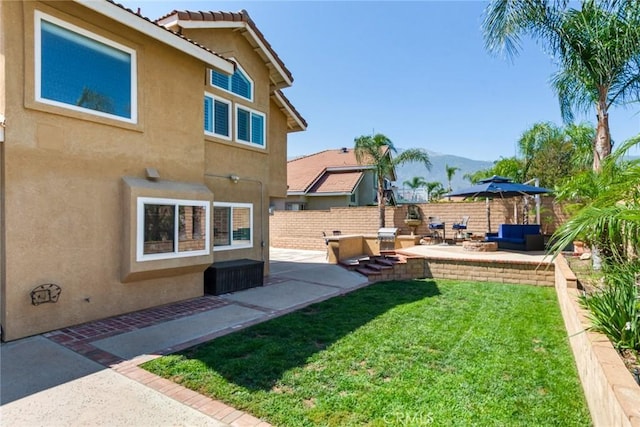 6915 Stanislaus Pl, Rancho Cucamonga, CA 91701 - view of yard with a patio area, an outdoor hangout area, and a mountain view