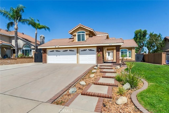 6915 Stanislaus Pl, Rancho Cucamonga, CA 91701 - view of front of home with a tile roof, driveway, an attached garage, a gate, and stucco siding