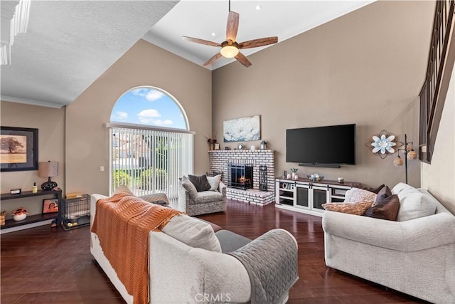 39981 Golfers Ln, Palmdale, CA 93551 - living room with ceiling fan, a brick fireplace, wood finished floors, high vaulted ceiling, and ornamental molding