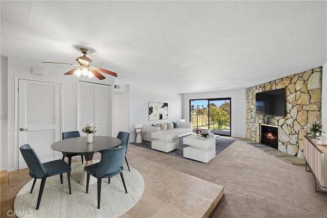 2501 S El Camino Real, San Clemente, CA 92672 - dining room featuring a fireplace, a ceiling fan, and light tile patterned floors