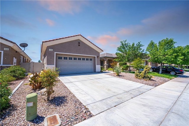 19385 Boulder St, Apple Valley, CA 92308 - single story home featuring driveway, stucco siding, an attached garage, a gate, and a tiled roof