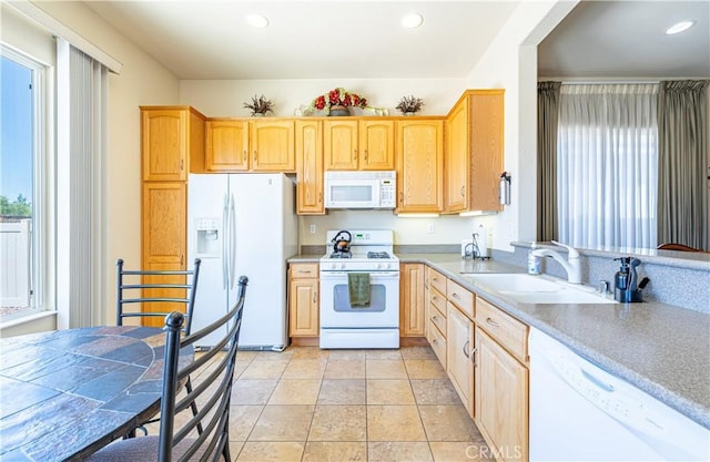 19385 Boulder St, Apple Valley, CA 92308 - kitchen featuring white appliances, light brown cabinets, light countertops, and recessed lighting