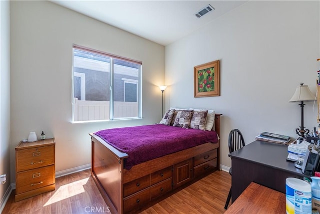 19385 Boulder St, Apple Valley, CA 92308 - bedroom with wood finished floors and a desk