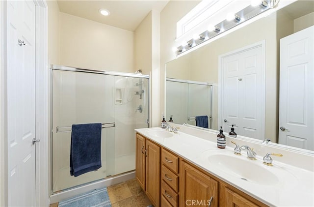 19385 Boulder St, Apple Valley, CA 92308 - bathroom featuring a stall shower and double vanity