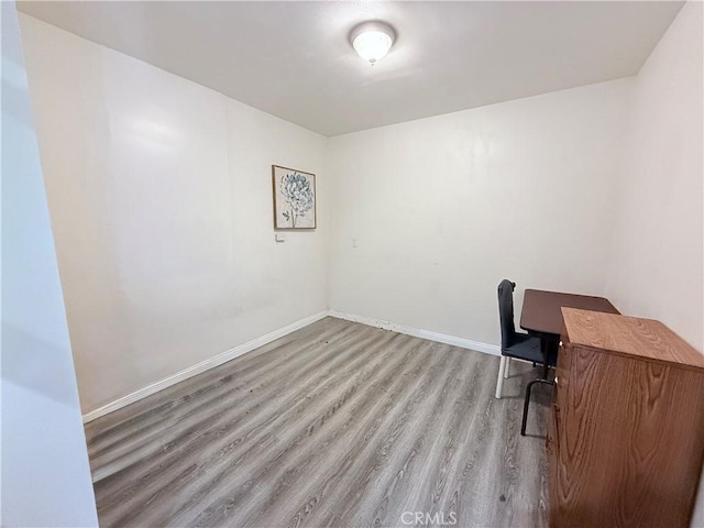4449 Walnut St, Baldwin Park, CA 91706 - unfurnished office with wood finished floors and baseboards