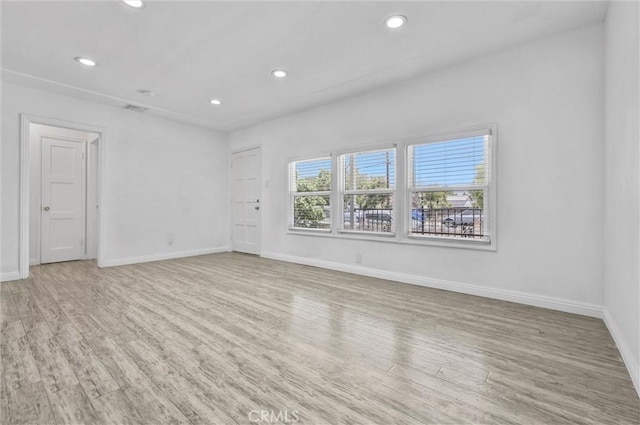 4449 Walnut St, Baldwin Park, CA 91706 - spare room featuring wood finished floors and recessed lighting