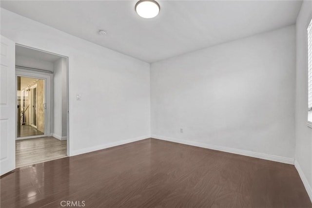 4449 Walnut St, Baldwin Park, CA 91706 - unfurnished room featuring wood finished floors and a smoke detector