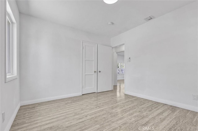 4449 Walnut St, Baldwin Park, CA 91706 - unfurnished room with wood finished floors and a smoke detector