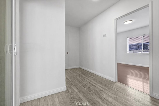 4449 Walnut St, Baldwin Park, CA 91706 - unfurnished room with wood finished floors and baseboards